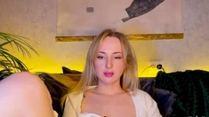 Pretty face and big tits blonde babe solo tease on