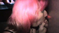 Wild young chick with pink hair blowing and banging gloryhole shafts