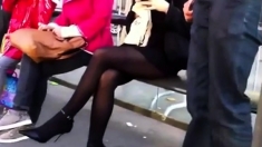 Pantyhose, High Heels And Short Skirt At Bus-stop