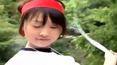 Japanese teen sucks outdoor